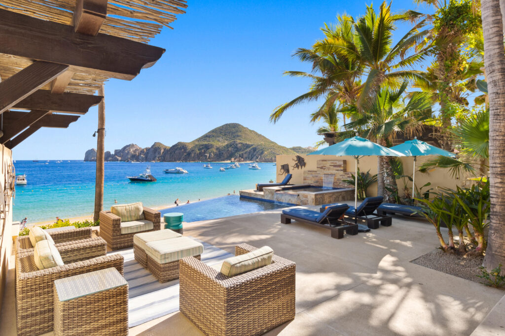 Cabo San Lucas Hacienda Csl Villa 5 sits right on El Médano Beach. It's a fully renovated four-bedroom beachfront home that'scomfortable, practical, and easy to live in. The layout is open and spacious, with indoor areas thatflow straight out to a large ocean- for sale