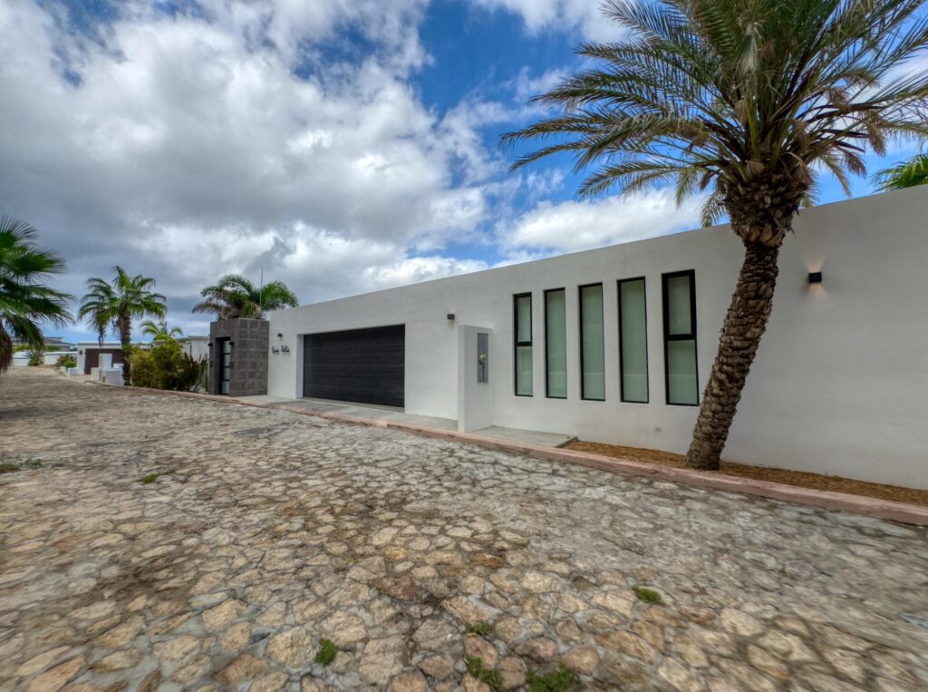 Cabo San Lucas Pedregal Csl Casa Bella redesigned encompasses a warm modern style combined with abundant lush landscaping.Situated on a large private corner lot with unobstructed oceans for sale