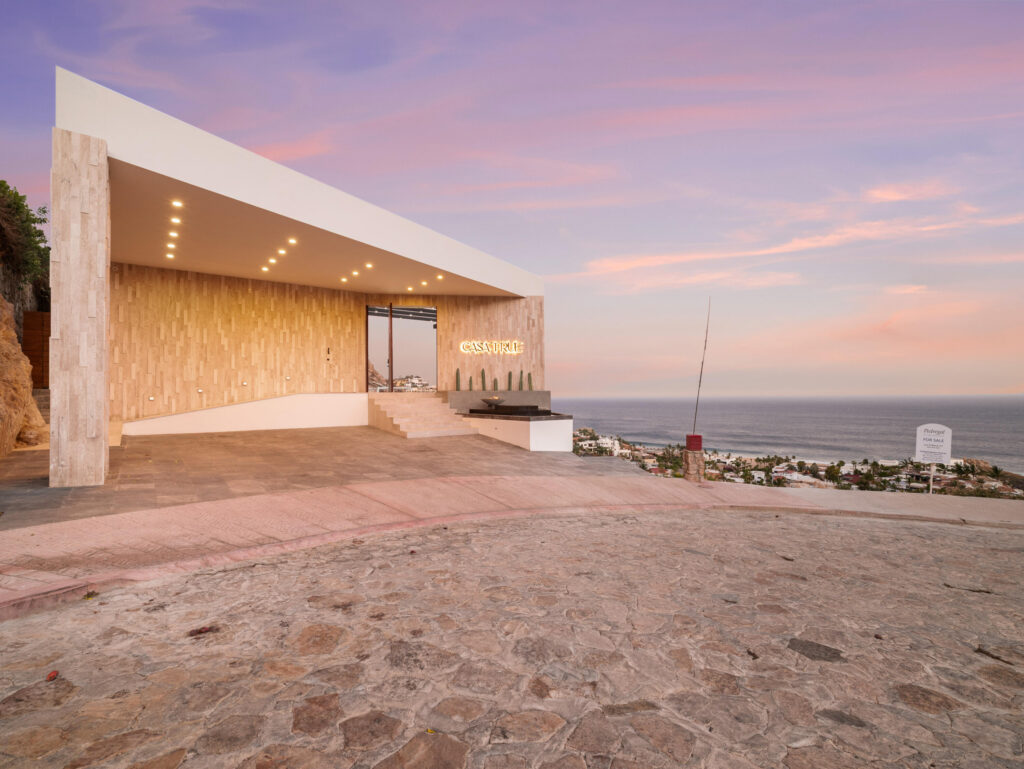 Cabo San Lucas Pedregal Csl Where the Pacific Becomes Your BackyardSome homes simply house you. This one transforms you.Perched in the coveted enclave of Pedregal -- Cabo San Lucas's most prestigious address -- this five-bedroom, six-and-a-half-bathroom estate is not just a property. It's a declaration. A fully furnished masterpiece where every room was designed with a single purpose: to make you feel like the most important person in the world, because here, you are.Step inside and the ocean doesn't just greet you -- it commands the room. A sweeping open-frame window turns the Sea of Cortez into living art, framed by handcrafted parota wood furniture that brings warmth, soul, and a sense of timeless Mexican craftsmanship to every gathering. Sunsets here aren't something you watch. They're something you host. The smart bedrooms offer panoramic ocean – 115 Cam. Grande, Cabo San Lucas, BS