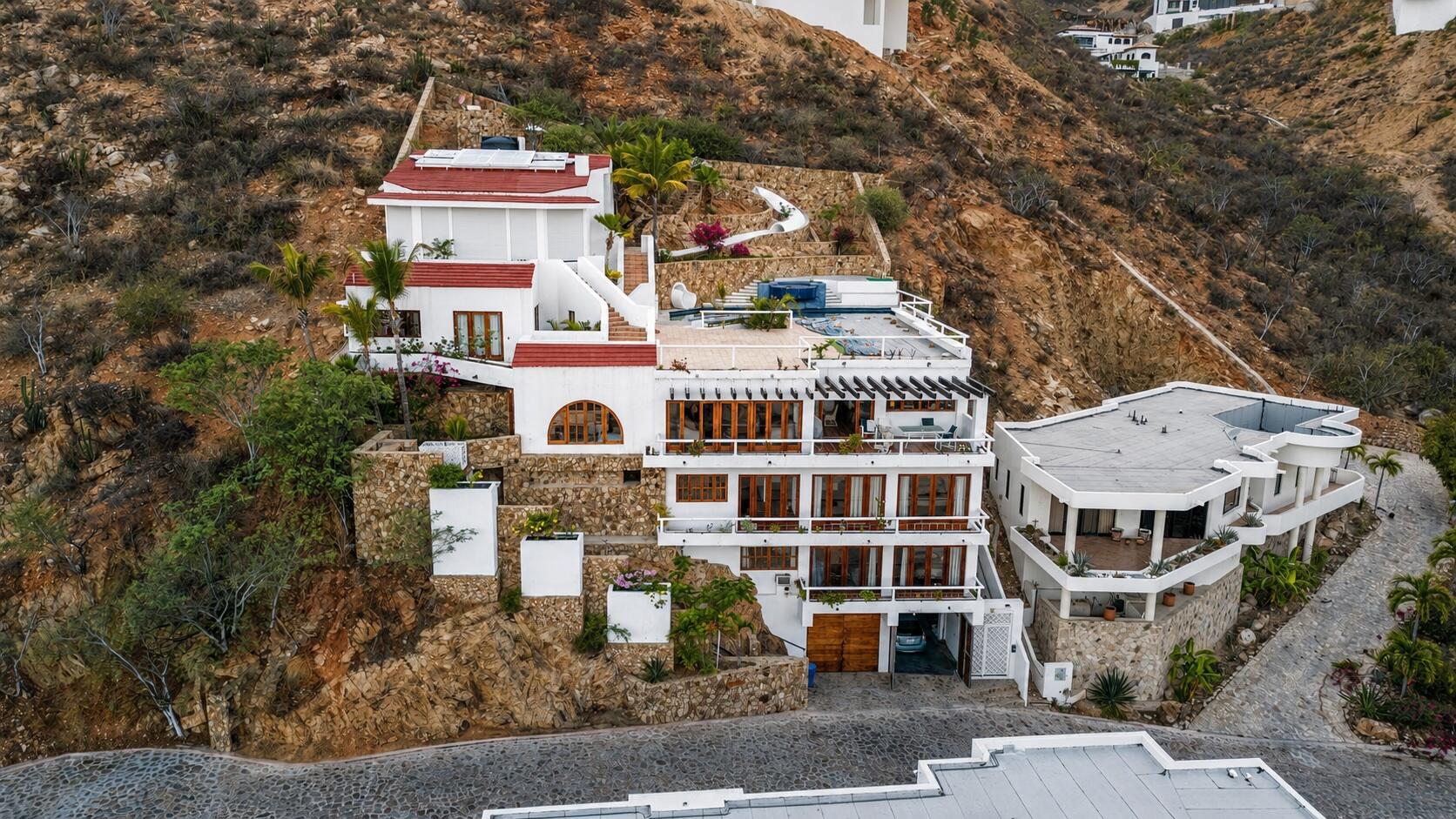 Cabo San Lucas Pedregal Csl Perched high above the marina and the Sea of Cortez, this extraordinary 10,000-square-foot estate is one of Pedregal's most iconic residences. Carved into the granite hillside, the property represents a remarkable piece of Cabo San Lucas history and offers an architectural experience unlike any other in Los Cabos.Panoramic – 115 Cam. Grande, Cabo San Lucas, BS